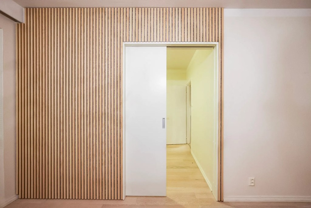 Akoestische scheidingswand met schuifdeur